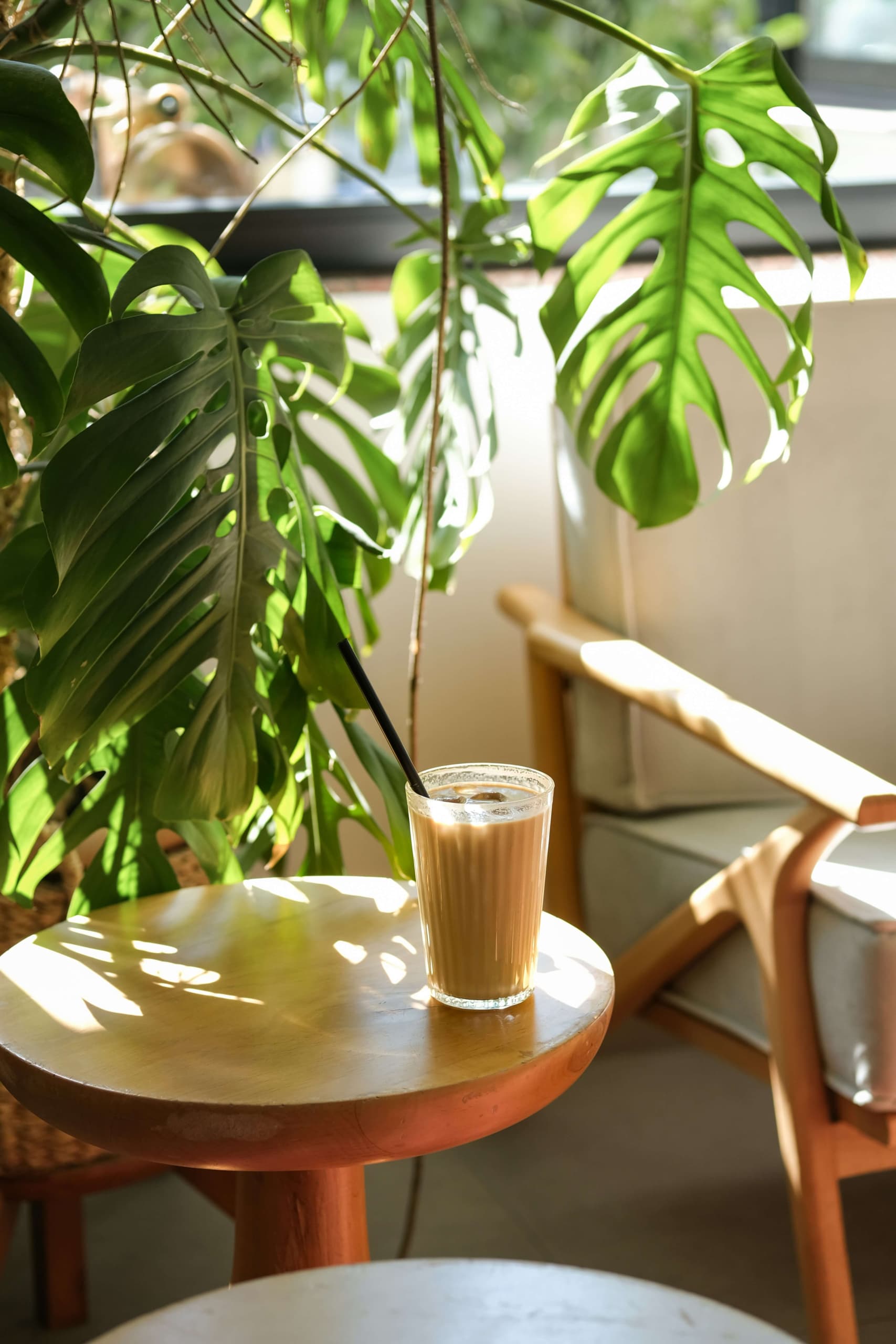Peaceful morning routine scene with journal, coffee, and natural light